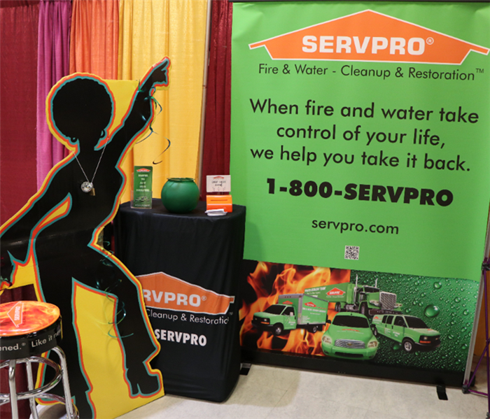 SERVPRO event booth decorated in disco theme.